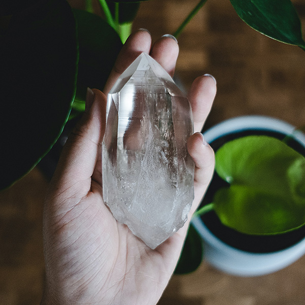 Lemurian crystal in hand. Photo by Dani Costelo on Unsplash