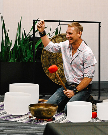 Bradford Tilden performing a sound healing during Energy Medicine Retreat